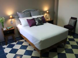 Entre Patios Hotel Boutique, hotel na may parking sa Le&oacute;n
