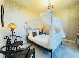 Top Floor Getaway with Cozy Canopy Bed