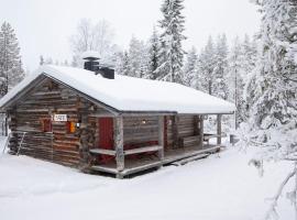 Satu 31, kahden makuuhuoneen kelomökki Syötteellä, valaistun ladun vieressä, strandhotel in Syöte