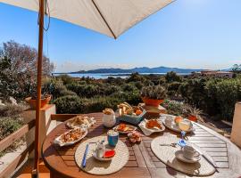 Pgs Immobiliare srls Ginestre S Villetta con terrazza vista mare, hotel in Villaggio Piras