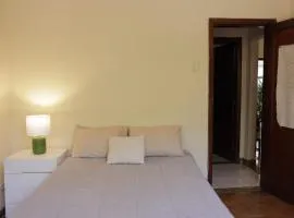 Quarto Casal com Varanda Casa Caramel