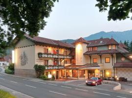 Erlebnis-Hotel-Appartements, хотел в Latschach ober dem Faakersee