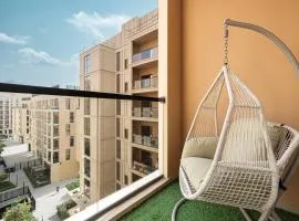 1BR Apartment With Balcony - 9 Mins to Sharjah Airport - Balcony Breeze