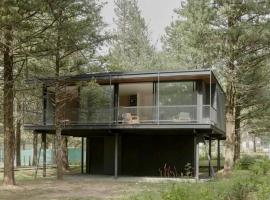 Casa entre pinos, cottage à Florida