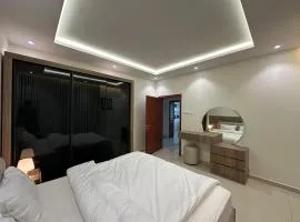 شقة فندقية فاخرة بغرفة وصالة الجال