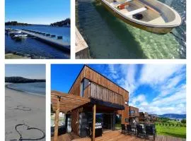 New Villa by the sea in Hervik, Spa and boat rental