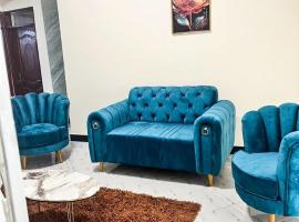 Serenity Found 2 Bed Haven with Private Balcony, hotel i Wakiso
