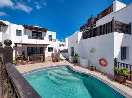 Casa Hibiscus - Shared Pool and BBQ - Close to Seafront Promenade By Lanzarote Vacation Homes