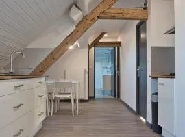 Chambres privées au calme avec espaces partagés
