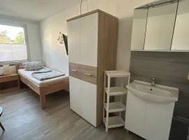 Einzelzimmer mit Gemeinschaftsbad