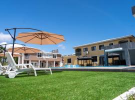 Adonai Apartments, hotell i Spintex