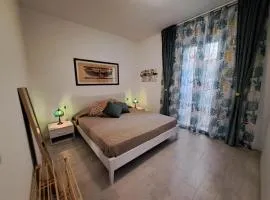 Splendido appartamento con piscina e vista mare