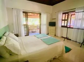 Flat Oxóssi cond beira-mar piscina varanda cozinha