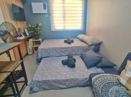 HOMELY Green 2 Residences near DLSUHSI, hotel i Dasmariñas