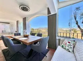 Stunning front line apartment with golf and mountains view