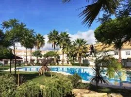 Casa en El Portil - 3-Bedroom Holiday Home including Paddle Tennis and Pool Near Golf Course