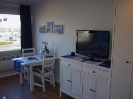 Inselblume 73 - G&uuml;nstige Ferienwohnung am S&uuml;dstrand，费曼城堡的附設泳池的飯店