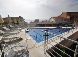 Apartment Joza with pool and sea view, 2 min walk to the beach