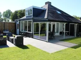 Ferienhaus "Buurtweg 219" mit Schwimmbad