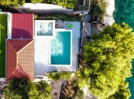Seaside apartments with a swimming pool Pisak, Omis - 23884