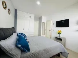 Relajate en Manta, habitacion y piscina