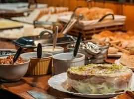 Pousada Arco Íris com Cafe, hotel v destinaci Urubici