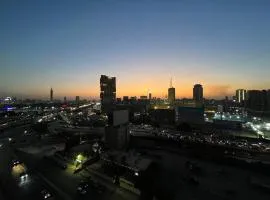 Cozy bedroom overlooking downtown & the Nile