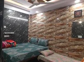 Aggarwal luxury rooms with private kitchen having all utensils, gas and fridge, wifi with android tv, fully air conditioning in cream location of lajpat nagar south delhi