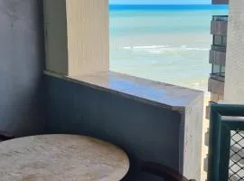 Flat Pé na areia