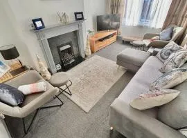 Entire holiday home in Blackpool with free parking and a private patio garden