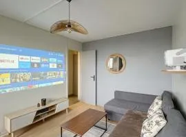 Cozy renovated apartment with cinema atmosphere and view