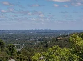 Escape to the Hills- Charming home with city views & walking distance to the 1000 steps