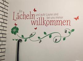 Ferienwohnung mit Seeblick, Hotel in Jemgum