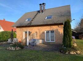 Boddenblick 3B, hotel in Fuhlendorf