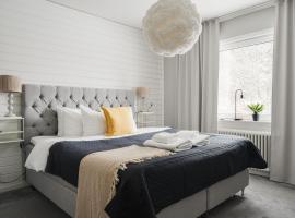 Guestly Homes - Modern 4BR Villa with Sauna, hotel in Piteå