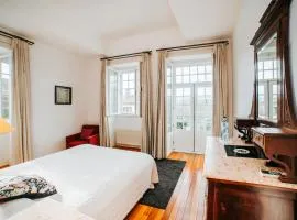 Quarto Duplo com Jardim e Piscina