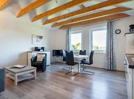 Ferienwohnung Ebbe mit Loggia und schönem Ausblick am Badesee Tannenhausen