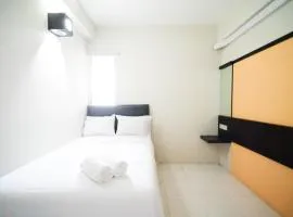 Homey and Comfy 2BR at Dian Regency Apartment By Travelio