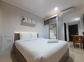 Cozy Studio Room at Patraland Amarta Apartment By Travelio