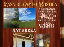 Osório Casa Rústica na Lagoa para 5 pessoas 2 quartos 250 metros da lagoabanhável 15 min da praia wiFi natureza tranquilidade, hotel i Osório