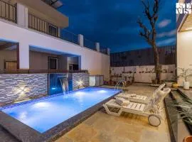 Nakeshatra Villa by VEO - Part of StayVista with Pool, Lawn, Balcony at city center in Udaipur