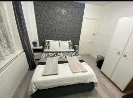 Modern bedroom with shared bathroom