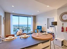 Sleek one-bedroom apartment with a panoramic view