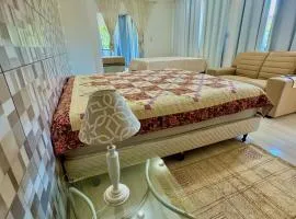 Casa espaçosa prox Centro Mini academia e 1 king size
