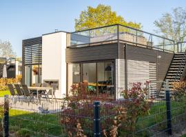 Excellent Cube mit Dachterrasse Meerblick und Strand, ξενοδοχείο σε Hulshorst