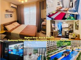 Cozy Pool and Seaview Condo in Cebu with Balcony near Mactan Airport, ξενοδοχείο σε Lapu Lapu City