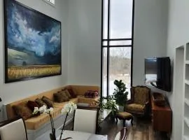 the Sugar Cube, a stunning, spacious, and modern villa with an orchard maze