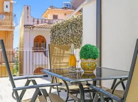 Terrace under Taormina just a few minutes walk to the free beach and downtown!