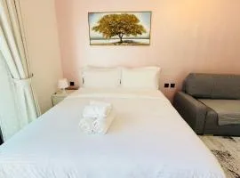 Lawnz Luxury furnished studio with Balcony Swimming Pool Gym Kids play ground