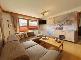 LECHUFER, 80m2, Haushälfte mit privatem Eingang, Kaminofen, Terrasse, Garten